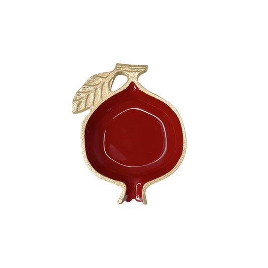Rote und goldene Granatapfelschale