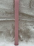 Rosewood colored stick candle