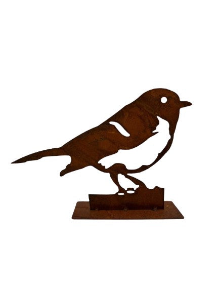 Vogel aus Metall rostig stehend