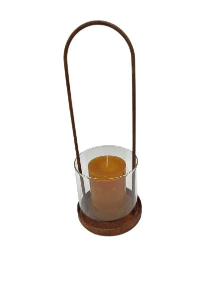 Lantern made of rusty metal with glass cylinder
