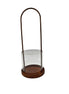 Lantern made of rusty metal with glass cylinder
